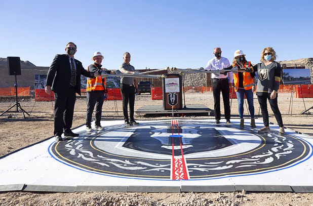 Officials pose with ceremonial lances during the celebration of a construction milestone at the Henderson Events Center construction site Wednesday, Oct. 28, 2020. From left: Henderson City Manager Richard Derrick, Vegas Golden Knights President Kerry Bubolz, Silver Knights Head Coach Manny Viveiros, Henderson City Councilman John Marz, Henderson Mayor Debra March and Henderson City Councilwoman Michelle Romero.