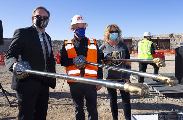 Officials pose with ceremonial lances during the celebration of a construction milestone at the Henderson Events Center construction site Wednesday, Oct. 28, 2020. From left: Henderson City Manager Richard Derrick, Vegas Golden Knights President Kerry Bubolz, and Henderson City Councilwoman Michelle Romero.
