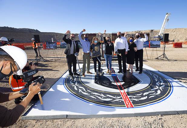 City of Henderson officials pose during the celebration of a construction milestone at the Henderson Events Center construction site Wednesday, Oct. 28, 2020. From left: City Manager Richard Derrick, Assistant City Manager Bristol Ellington, Councilwoman Michelle Romero, Mayor Debra March, Councilman John Marz, Chief Staegy Officer Stephanie Garcia-Vause, and Chief Infrastructure Officer Robert Herr.
