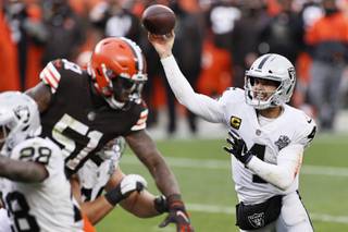 Las Vegas Raiders quarterback Derek Carr (4) passes during the second half of an NFL football game against the Cleveland Browns, Sunday, Nov. 1, 2020, in Cleveland. (AP Photo/Ron Schwane)