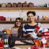Owner of Any Occassion Baskets Felicia Parker, right, and VP of Customer Accounts Ilka Brown pose for a photo in their work space, Monday, Nov. 2, 2020.