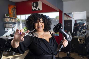 Owner Danielle Green poses at Radically Curly Salon inside Sola Salons in Henderson Friday, Nov. 13,&nbsp;2020.