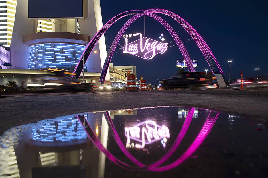 Illuminated Gateway Arches Welcome Visitors to Downtown Las Vegas