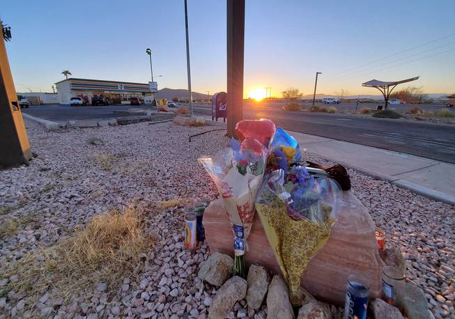 A makeshift memorial is shown near a convenience store in Henderson where a gunman opened fire Thursday, Nov. 26, 2020.