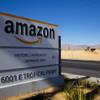Construction crews work at the site of a new Amazon Fulfillment Center in North Las Vegas, Wednesday, Dec. 2, 2020.
