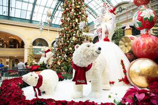 At this year's winter wonderland display, a snow queen emerges from an enchanted forest to greet guests at the Bellagio. This scene from Monday, Dec. 7, 2020, also features affable polar bears and a centerpiece 42-foot fir tree.