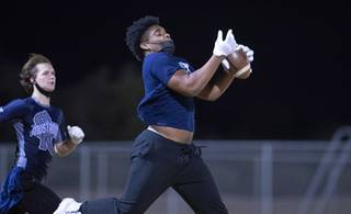 Shadow Ridge High senior Dion Washington catches a pass during a practice at Aviary Park in North Las Vegas Thursday, Dec. 10, 2020. Washington will sign a national letter of intent to play college football at University of Nevada, Reno on Dec. 16.