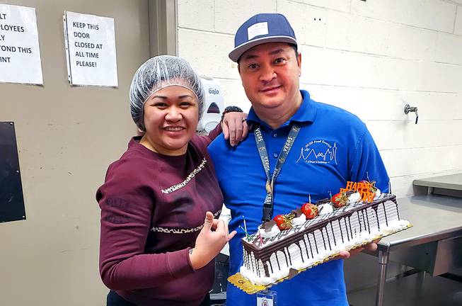 Ronaldo Cesa, the well-liked cafeteria manager at Ronnow Elementary School, died of COVID-19 on April 2, 2020. He is shown celebrating his March 20 birthday with friend and colleague Mai Macapagal-Malimban.