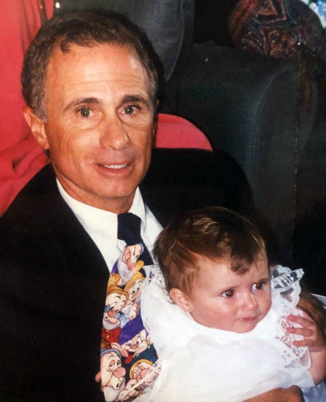 Alan Andrews, who died from COVID-19 at age 77, is shown with his daughter Rebecca in this family photo. 