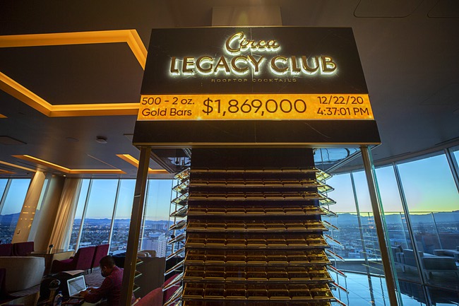 Five hundred gold bars are shown in a case at the Legacy Club, a rooftop lounge, at Circa in downtown Las Vegas Tuesday, Dec. 22, 2020. The displayed value of the bars adjusts with the current gold prices, said casino owner Derek Stevens.