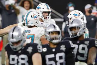 Miami Dolphins kicker Jason Sanders (7) celebrates after making a game-winning field goal with seconds left during the second half of an NFL football game against the Las Vegas Raiders, Saturday, Dec. 26, 2020, in Las Vegas.