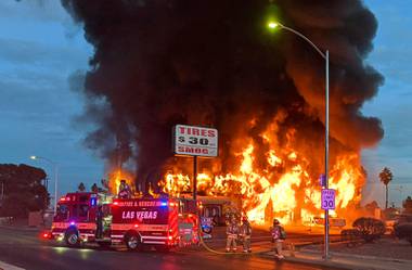 A two-alarm fire destroys a tire shop on the southeast corner of Meadows Lane and Decatur Boulevard in Las Vegas Wednesday, Dec. 30, 2020.