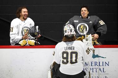 Vegas Golden Knights right wing Mark Stone (61), goaltender Marc-Andre Fleury (29), and goaltender Robin Lehner (90) laugh during a break in training camp at City National Arena Wednesday, Jan. 6, 2021.