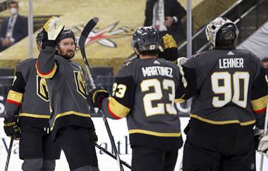 Vegas Golden Knights right wing Mark Stone (61) celebrates with teammates after the team’s win over the Anaheim Ducks in an NHL hockey game Thursday, Jan. 14, 2021, in Las Vegas.