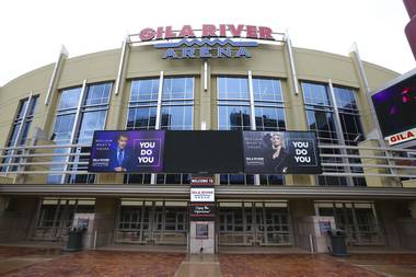 The Gila River Arena, home of the Arizona Coyotes hockey team, is shown after being shuttered because of the coronavirus pandemic, Thursday, March 12, 2020, in Glendale, Ariz.