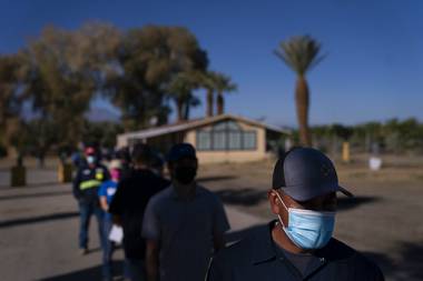 Migrant workers lined up by the hundreds during a break from picking produce this week to receive the coronavirus vaccine on a Southern California grape farm.