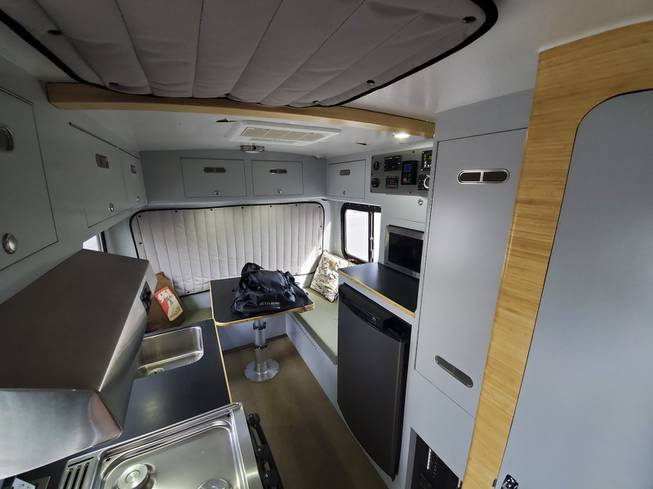 The interior of a custom-built 1987 Toyota Sunrader built by Matt Linder, co-owner of TruckHouse, which is manufacturing a high-end $300,000 recreational vehicle, the BCT based on this "proof of concept." 