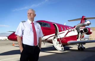 AirSmart Chief Pilot Chris Honea poses by a Pilatus PC-24 twin-engine jet at the North Las Vegas Airport Tuesday, Feb. 2, 2021. AirSmart is an 