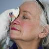 Madeleine Franco, founding president of Southern Nevada Parrot Education, Rescue & Rehoming Society, holds a 19-year-old Bare-eyed Cockatoo named Molly, Tuesday, Feb. 2, 2021.