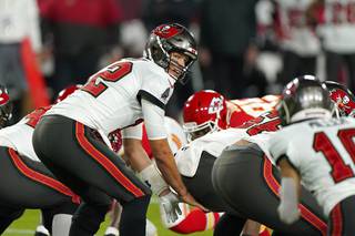 Tampa Bay Buccaneers quarterback Tom Brady takes a snap during the first half of the NFL Super Bowl 55 football game against the Kansas City Chiefs Sunday, Feb. 7, 2021, in Tampa, Fla. (AP Photo/Gregory Bull)


