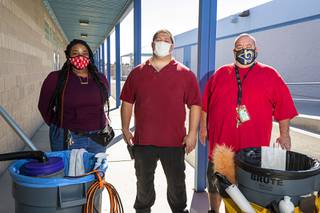 The custodial crew poses for a photo at Stanford Elementary School Friday, Feb. 12, 2021. From left: Samantha Fitch, head custodian David Longoria-Buffington, and Lance Proehl.