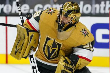 Vegas Golden Knights goaltender Marc-Andre Fleury (29) blocks a shot by the Colorado Avalanche during the third period of an NHL hockey game Sunday, Feb. 14, 2021, in Las Vegas. 


