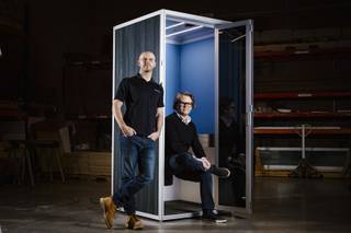 From left, founders Nick Pucci and Anthony Pucci of Cubicall Phone Booths, pose for a photo at their company warehouse, Wednesday, Feb. 17, 2021.