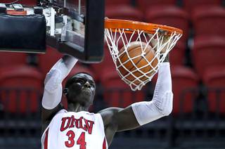 UNLV Rebels forward Cheikh Mbacke Diong (34) dunks during a game against the Fresno State Bulldogs at the Thomas & Mack Center Wednesday, Feb. 24, 2021.