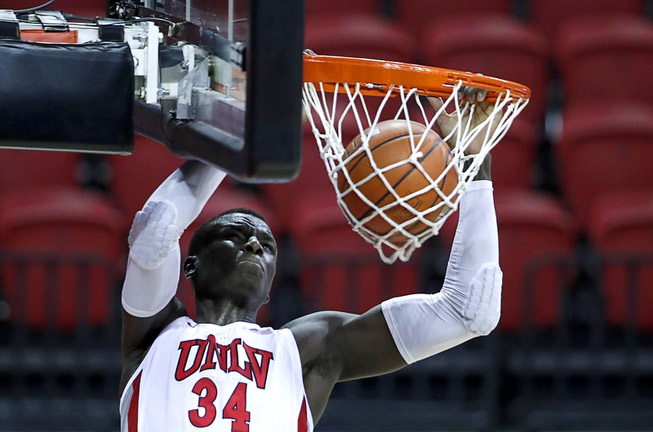 UNLV Rebels forward Cheikh Mbacke Diong (34) dunks during a ...