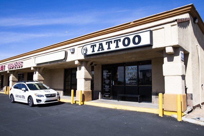 An exterior view of the Black Omen Tattoo shop in ...