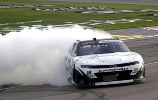 NASCAR Xfinity Series driver AJ Allmendinger (16) performs a burnout after winning the Alsco Uniforms 300 at the Las Vegas Motor Speedway Saturday, March 6, 2021.