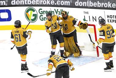 Vegas Golden Knights celebrate after holding off the San Jose Sharks in the third period at T-Mobile Arena Wednesday, March 17, 2021. The Golden Knights beat the Sharks 5-4.