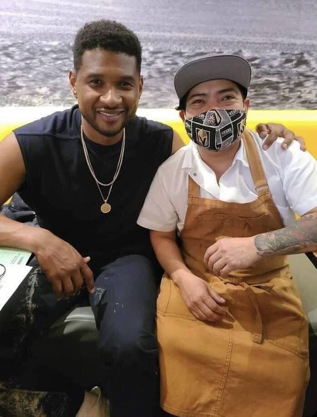 Usher with Esther's Kitchen chef Pedro Vidal.