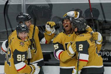 Vegas Golden Knights forward Keegan Kolesar (55) celebrates with his team after scoring his first goal in the NHL against St. Louis in the third period at T-Mobile Arena, Monday, March 22, 2021. The Golden Knights won Blues 5-1.