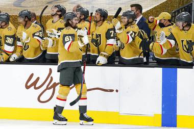 Vegas Golden Knights right wing Mark Stone (61) celebrates after scoring against the St. Louis Blues during the third period of an NHL hockey game Monday, March 22, 2021, in Las Vegas. 