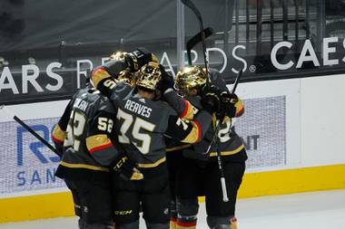 The Vegas Golden Knights celebrate after scoring against the LA  Kings in the second period of their game at T-Mobile Arena, Monday, March 29, 2021.