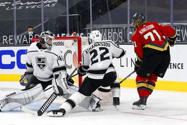 Vegas Golden Knights center William Karlsson (71) scores past Los Angeles Kings goaltender Calvin Petersen (40) and left wing Andreas Athanasiou (22) in the second period of a game in T-Mobile Arena Wednesday, March 31, 2021.