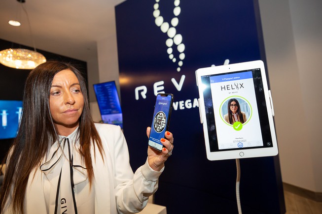 Sarah Lomas, founder and CEO of Reviv Global, demonstrates the ...