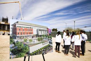 A rendering of the UNLV School of Medicine bearing the name of prominent businessman and philanthropist Kirk Kerkorian sits at the construction site for the building Thursday, April 8, 2021 following the official announcement. YASMINA CHAVEZ
