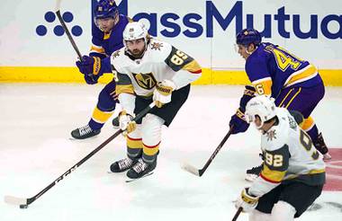 Vegas Golden Knights right wing Alex Tuch (89) takes control of the puck during the first period of an NHL hockey game against the Los Angeles Kings Wednesday, April 14, 2021, in Los Angeles. (AP Photo/Ashley Landis)