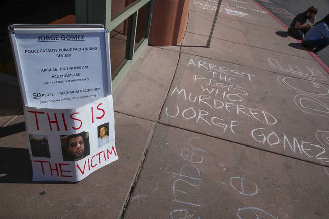 People protest the killing of Jorge Gomez by Las Vegas police outside the Clark County Government building as a fact finding review takes place inside, downtown, Friday, April 16, 2021.