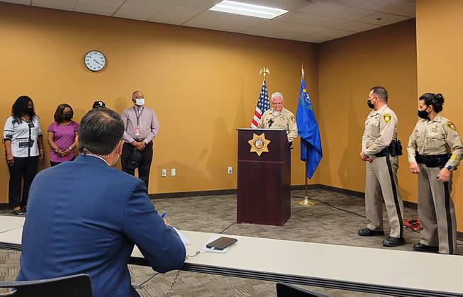 Metro Police Undersheriff Christopher Darcy, center, speaks during a news conference at Metro Police headquarters Tuesday, April 20, 2021. Darcy addressed the case of former Minneapolis police officer Derek Chauvin, who was found guilty in the death of George Floyd. 