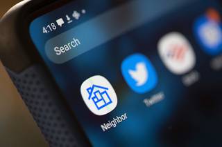 The icon for the Neighbor App is shown on Carlos Macias' phone Wednesday, April 21, 2021. Neighbor is an App that helps match people who need storage with people who have storage space.