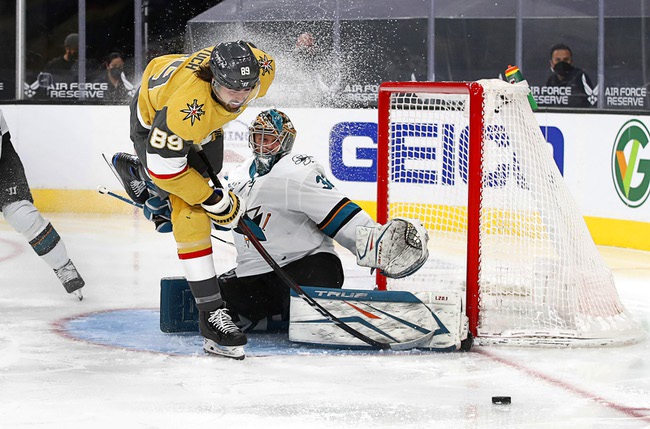 Vegas Golden Knights right wing Alex Tuch (89) skates past San Jose Sharks goaltender Josef Korenar (32) after a scoring attempt in the second period of a game at T-Mobile Arena Wednesday, April 21, 2021.
