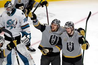 Henderson Silver Knights forward Pavel Dorofeyev, right, celebrates with right wing Lucas Elvenes after scoring in the third period of an AHL hockey game against the San Jose Barracuda at T-Mobile Arena Saturday, May 8, 2021.