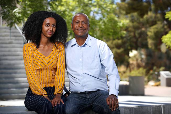 Graduate student Adugna "Adu" Siweya poses with his daughter Dagmawit Teka, 23, at UNLV Tuesday, May 11, 2021. Siweya, an immigrant from Ethiopia, will graduate with a Master's Degree in Public Health on Thursday.  Teka is a student at George Washington University.