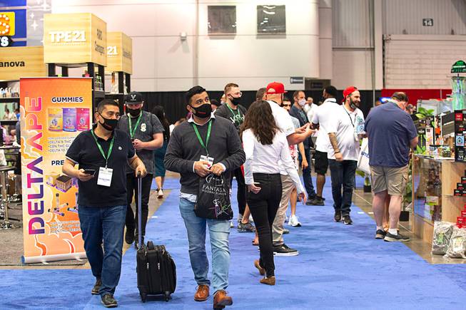 Attendees are shown during the Tobacco Plus Expo (TPE21) at the Las Vegas Convention Center Wednesday, May 12, 2021. The convention, the first at the LVCC since the COVID-19 shutdown, is expected to attract 350 exhibitors and 4,500 attendees.