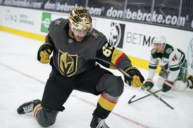 Golden Knights left wing Max Pacioretty (67) celebrates after scoring against the Minnesota Wild during overtime of an NHL hockey game Monday, March 1, 2021, in Las Vegas. 
