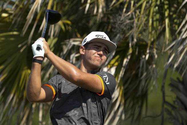 Garrick Higgo, of South Africa, watches his tee shot on the third hole during a practice round at the PGA Championship golf tournament on the Ocean Course Tuesday, May 18, 2021, in Kiawah Island, S.C.