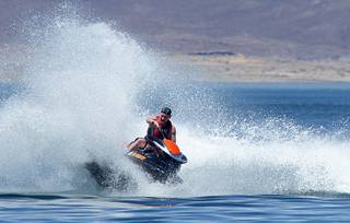 A jet skier performs a tight turn at Lake Mead Thursday, May 27, 2021.